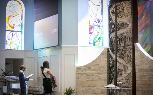 Bar mitzvah facing the arch in Temple Beth Am in Jupiter, Florida