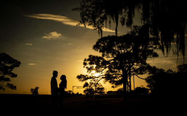 Engagement couple silhouette at Ever After Farms Ranch Wedding Barn in Indiantown, Florida